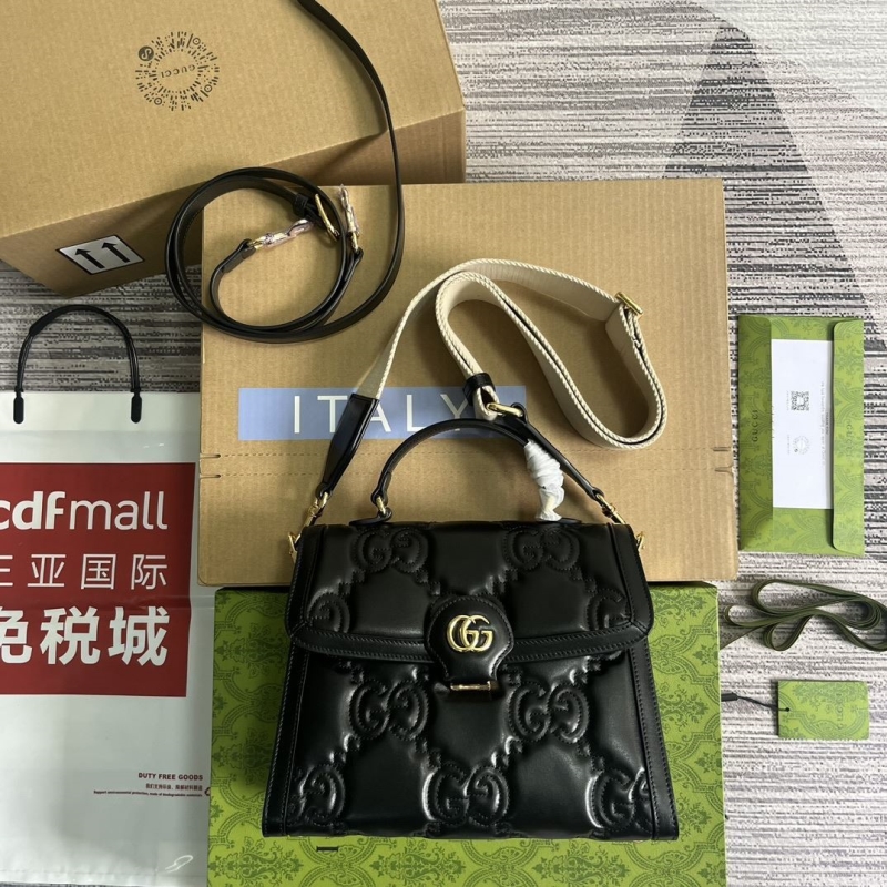 G*u*i top handle bags